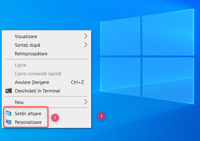 DÄƒ clic dreapta pe desktop È™i alege SetÄƒri afiÈ™are sau Personalizare